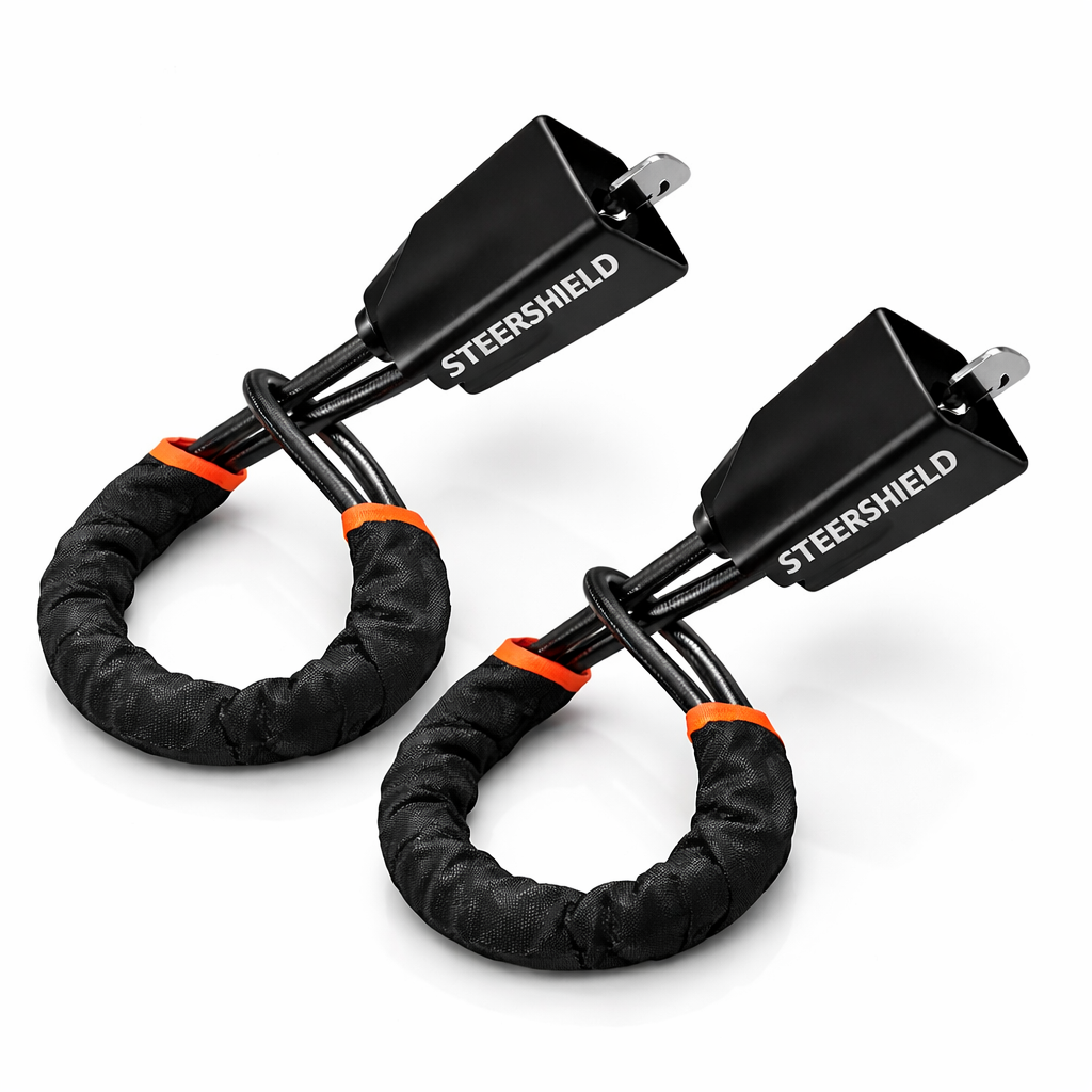 SteerShield anti-theft steering wheel lock fitted to a car
SteerShield steel cable resisting bolt cutters
SteerShield hardened lock core close-up
SteerShield steering wheel and seat belt lock universal fit
Driver installing SteerShield car security lock in seconds