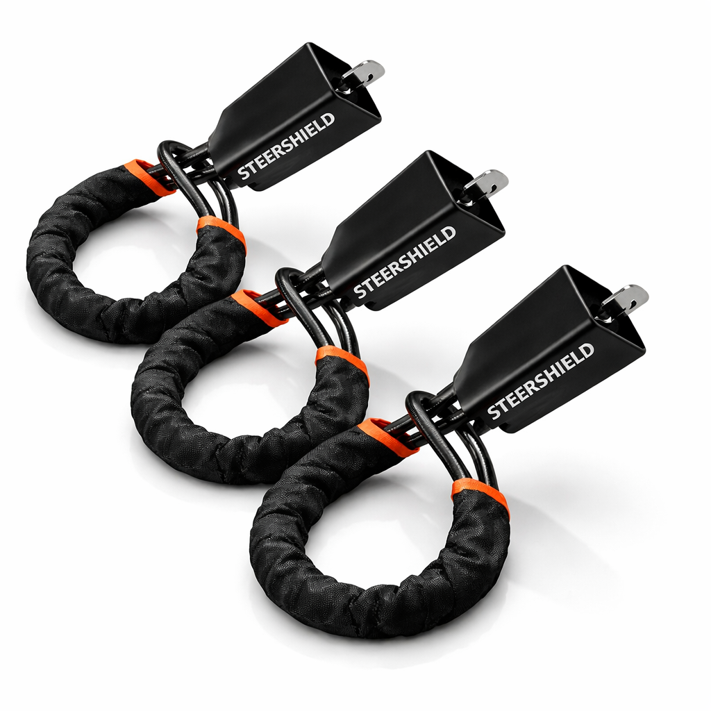 SteerShield anti-theft steering wheel lock fitted to a car
SteerShield steel cable resisting bolt cutters
SteerShield hardened lock core close-up
SteerShield steering wheel and seat belt lock universal fit
Driver installing SteerShield car security lock in seconds