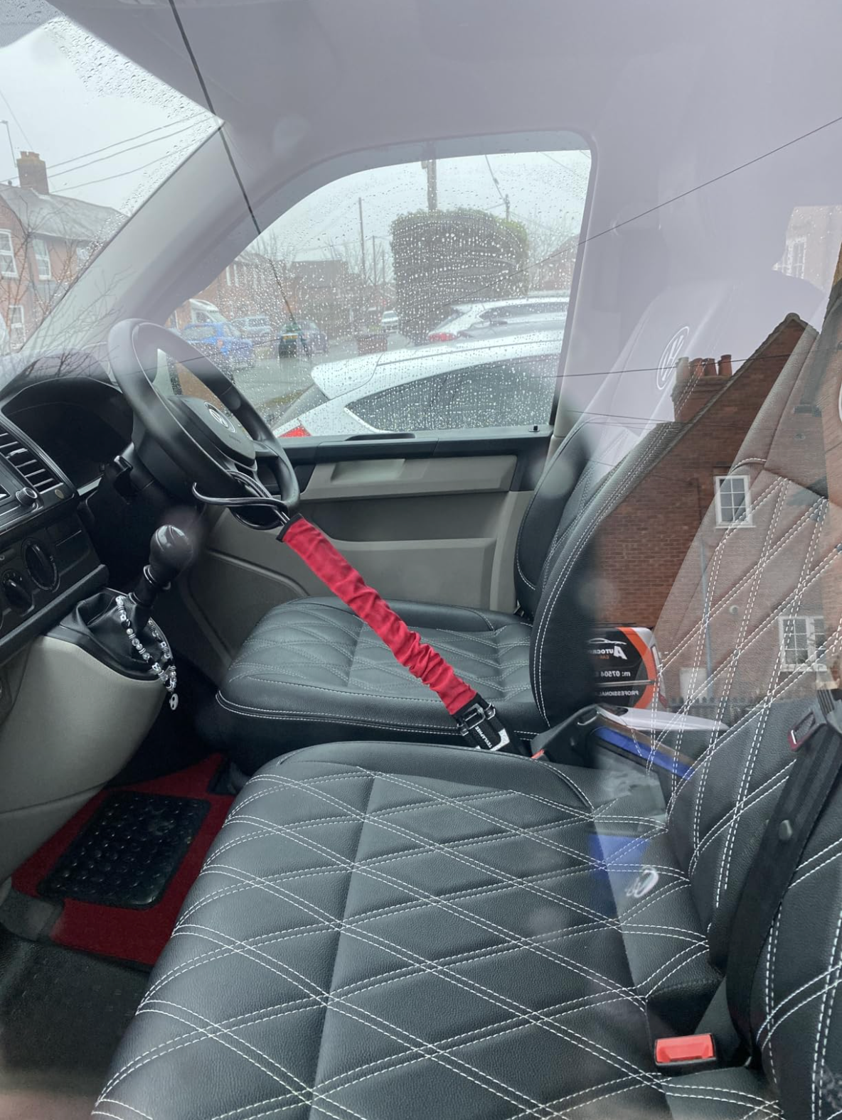 SteerShield anti-theft steering wheel lock fitted to a car
SteerShield steel cable resisting bolt cutters
SteerShield hardened lock core close-up
SteerShield steering wheel and seat belt lock universal fit
Driver installing SteerShield car security lock in seconds
